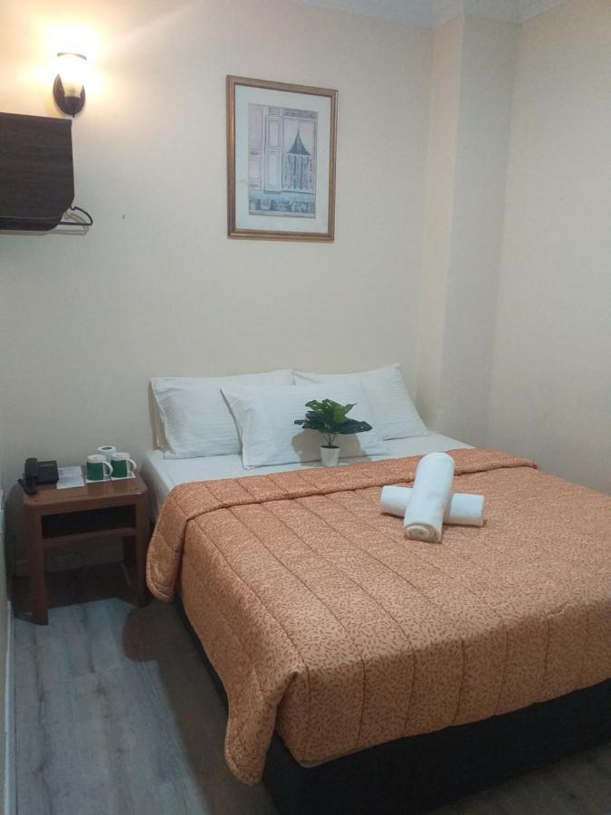 เฮนเตียน โฮเทล กาจัง Hotel ภายนอก รูปภาพ